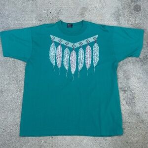 Teal Graphic T-Shirt with Feather Design